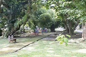 Corner lot for sale, just across the stree from the park in Llanos de Curundu