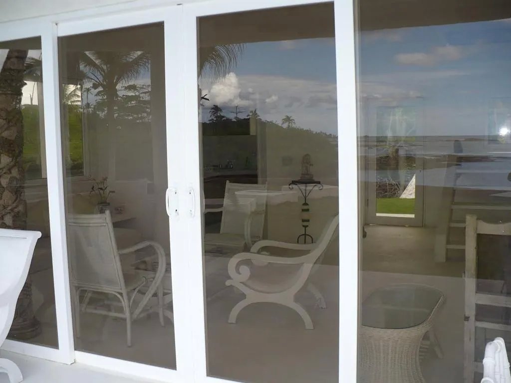PROPERTY FOR SALE Caribbean beach front home and boat dock for sale with almost 2 acres of land minutes from San Blas islands - Bargain!