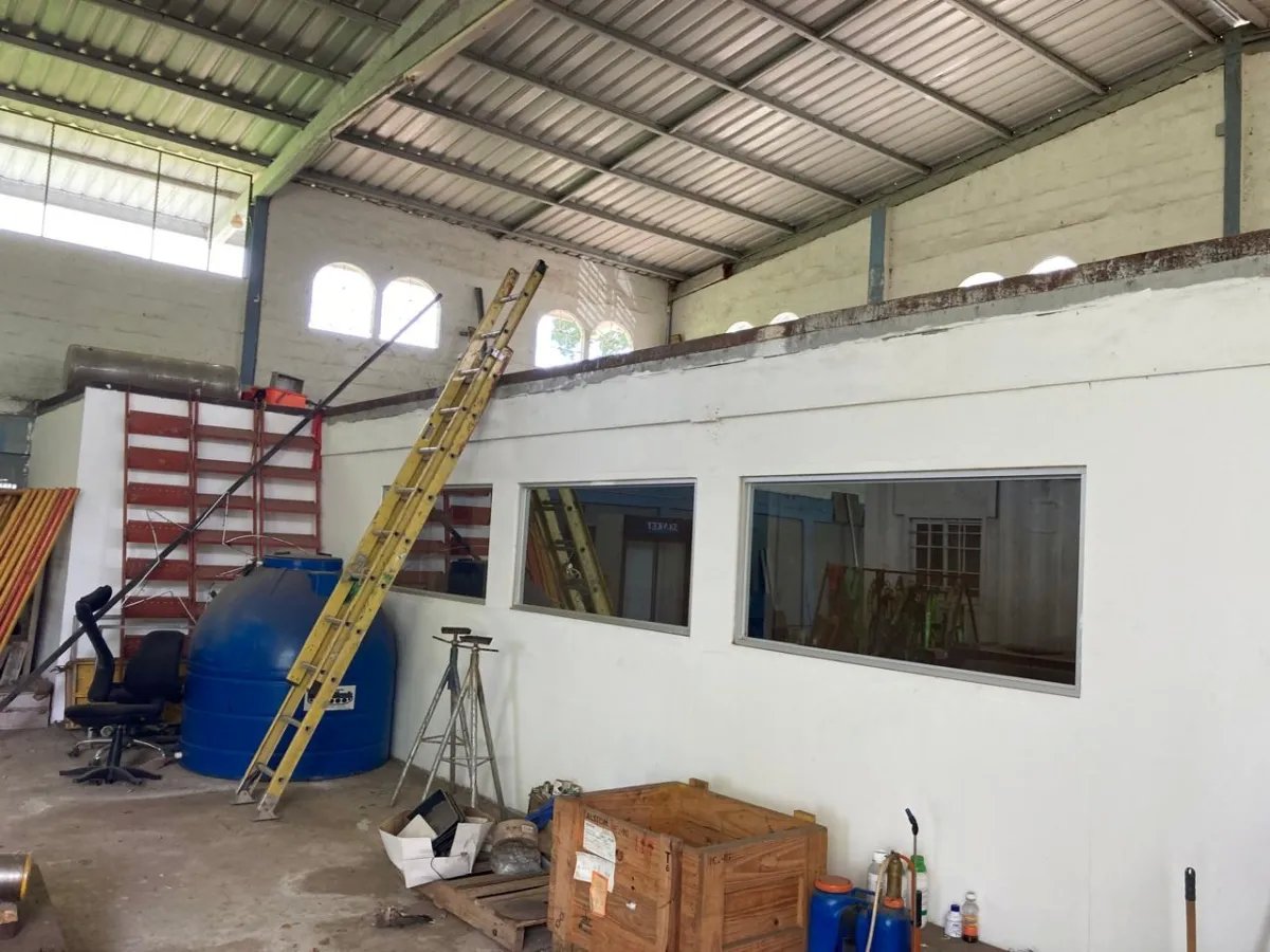 Huge workshop, offices and residential building on a large plot of land