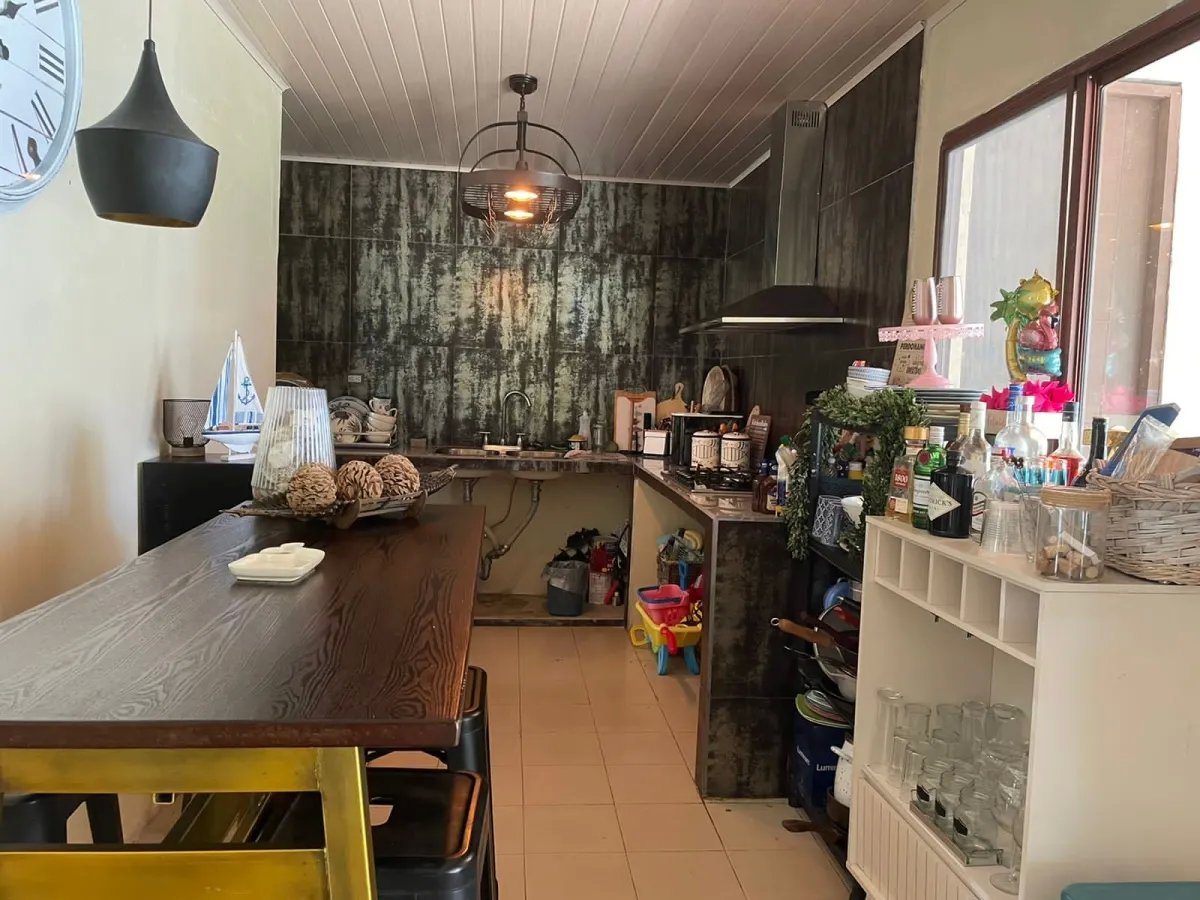 Lote comercial con casa en santa catalina pueblo centee