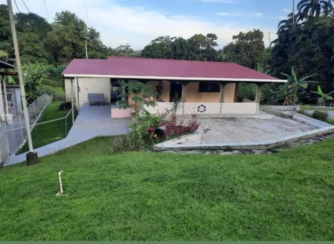 Negotiable Investment Opportunity: Titled Property with 2 Houses on th...