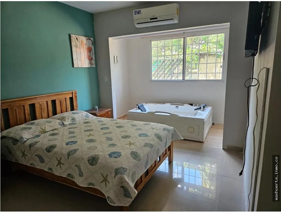 BEACH HOUSE IN GATED RESIDENTIAL COMMUNITY WITH SOCIAL AREAS